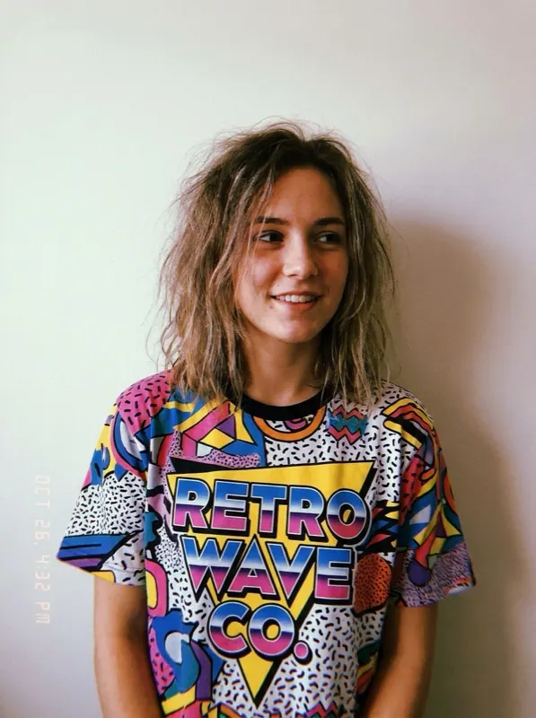 Fictional person wearing a brightly patterned t-shirt