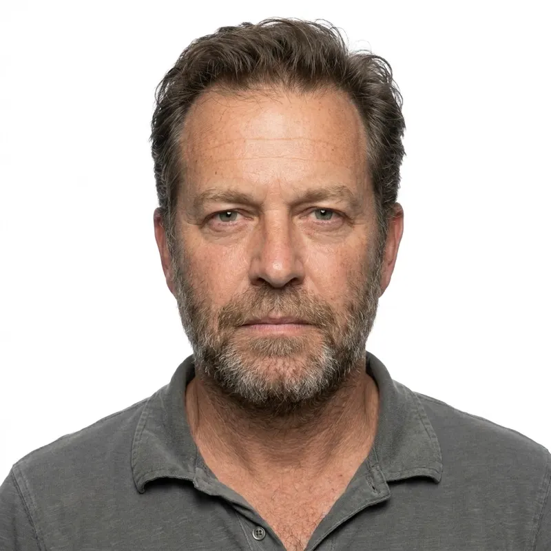 ChatGPT passport photo prompt result: plain white background, even lighting, passport-style crop